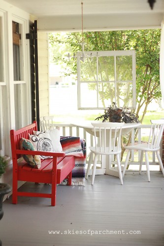 grey porch floor with red and white accents