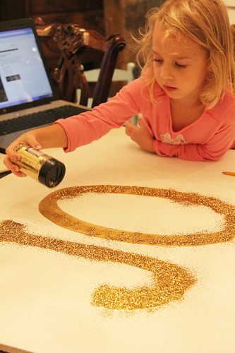 adding the glitter