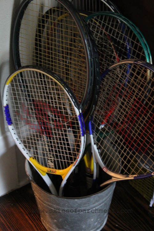 a collection of tennis rackets