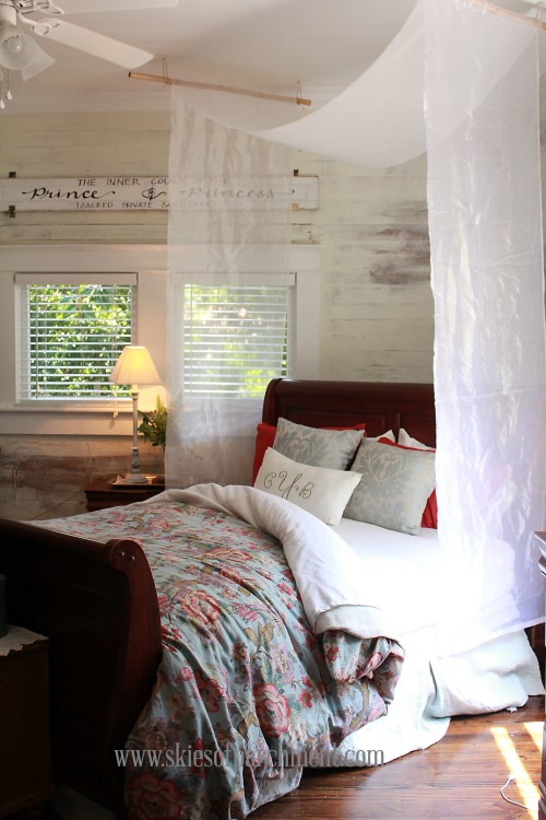 master bedroom in whites and blue